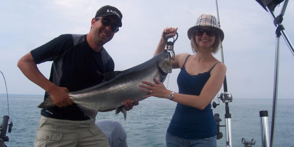 couples catching king salmon